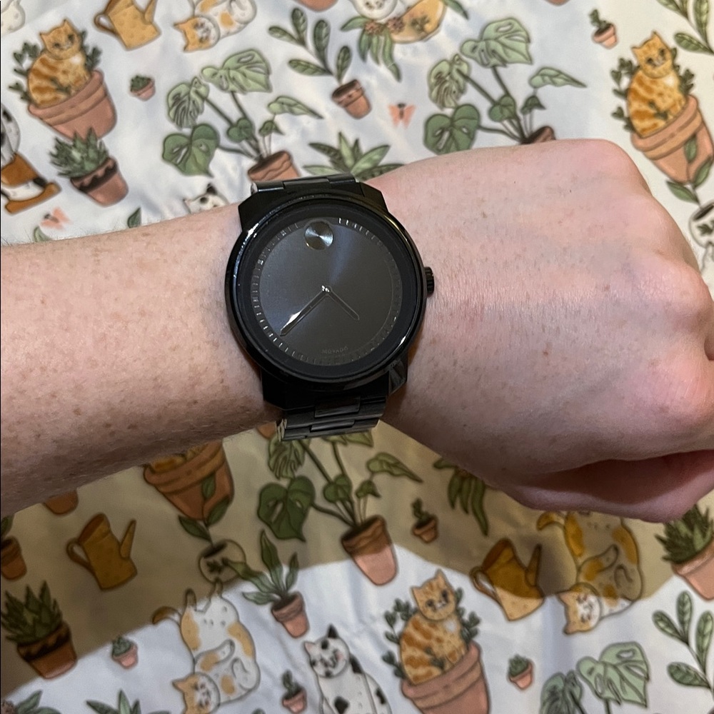 Black Metal watch with blue undertones with Silver Accents